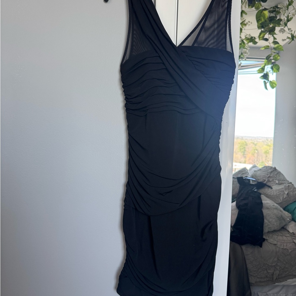 Elegant Black Sleeveless Mini Dress with Mesh Detail